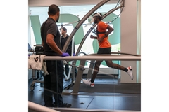 Image A person running in a lab.